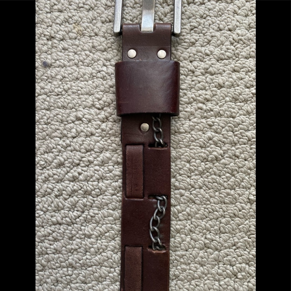 Sandwich leather basket weave look belt.